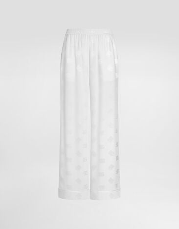 Dolce & Gabbana Silk satin jacquard pajama pants with all-over DG logo Black FTBM0TFU21E