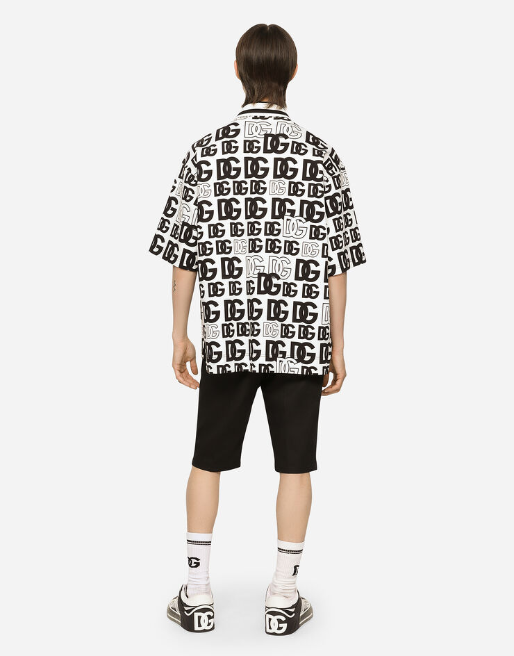 Dolce & Gabbana Cotton piqué polo-shirt with all-over DG logo print Multicolor G8OL1THS7IT