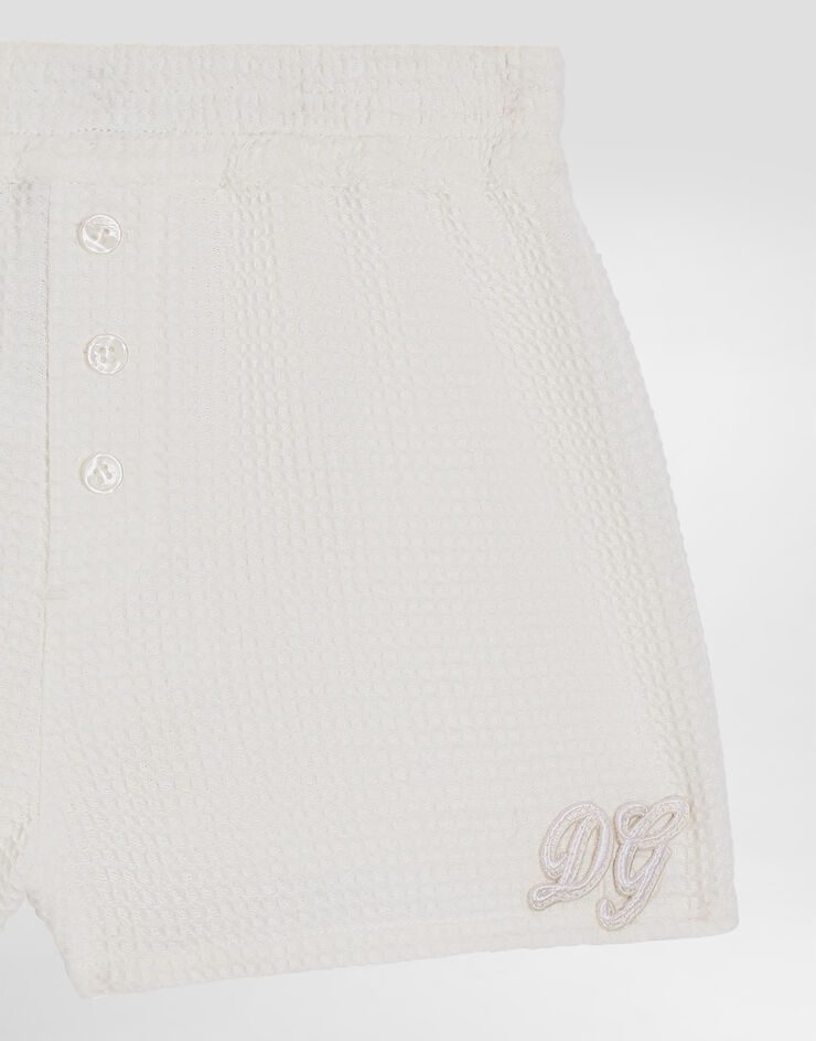Dolce & Gabbana Cotton waffle bermuda shorts Dolce & Gabbana Cotton waffle bermuda shorts White L13Q97FU628