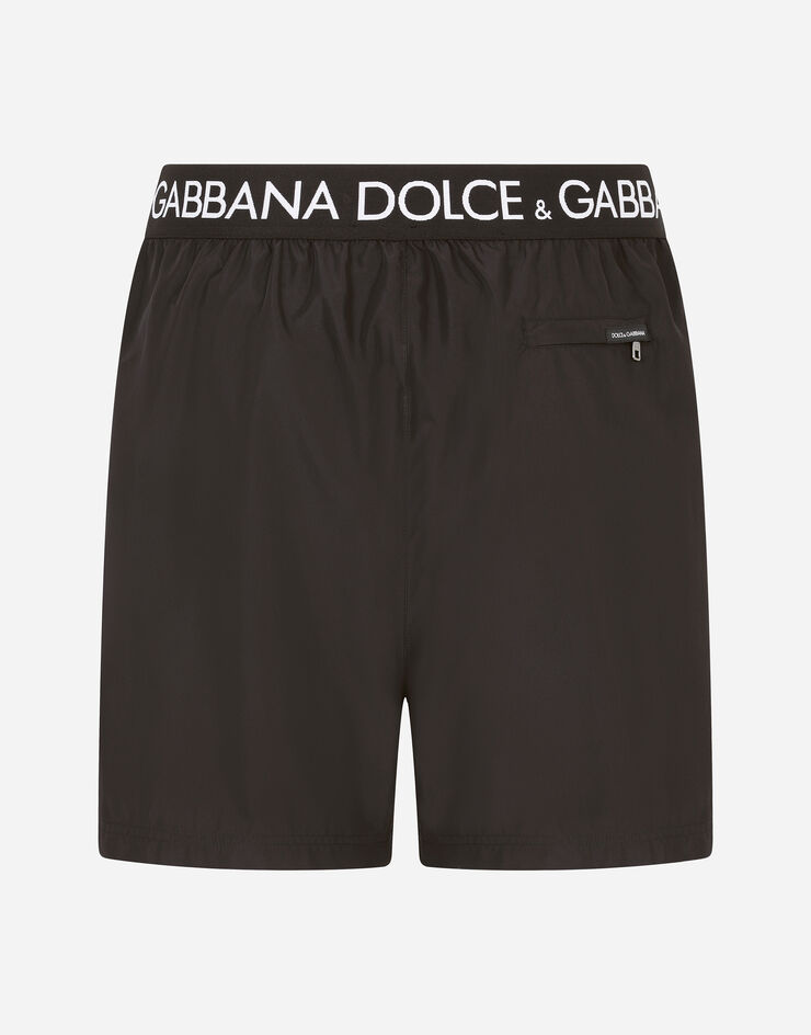 Dolce & Gabbana Mid-length swim trunks with branded stretch waistband Black M4B45TFUSFW