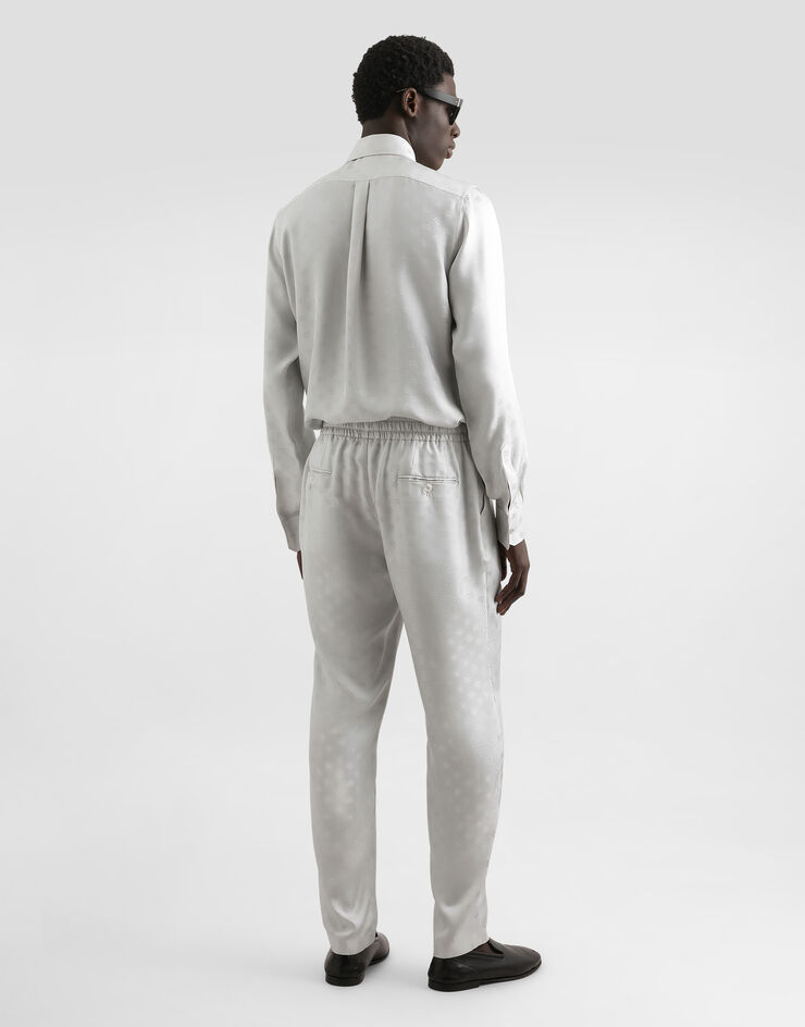 Dolce & Gabbana Pantalon de jogging en jacquard à logo DG Gris GP12QTFJ1JY