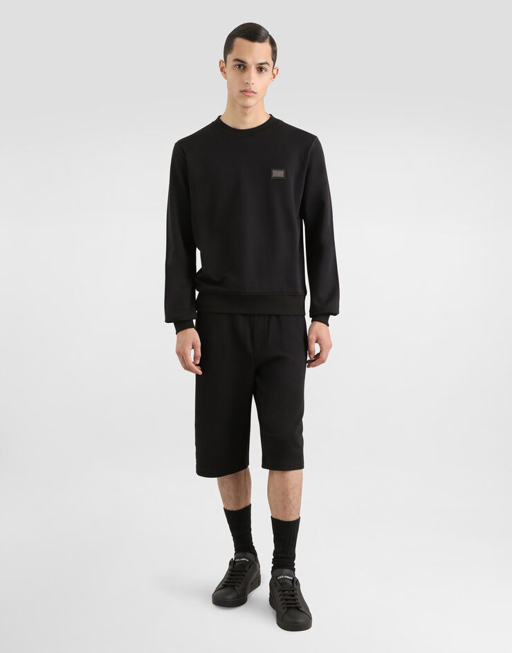 Dolce & Gabbana Bermudas de chándal en punto con placa con logotipo Negro GVB7HTG7F2G