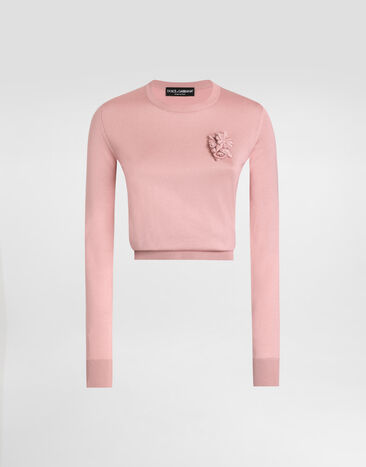Dolce & Gabbana Langarmpullover aus Seide mit Blumenverzierung Rosa FXX12ZJBSKY
