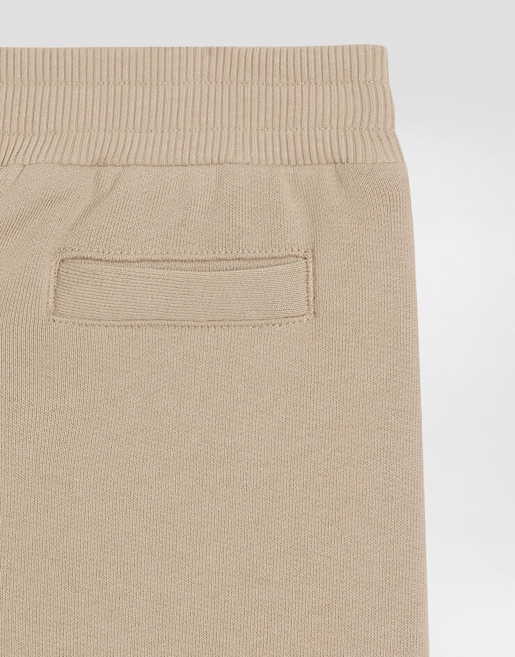 Dolce & Gabbana Fleece trousers with Dolce&Gabbana embroidery Beige L1JPKVG7PEQ