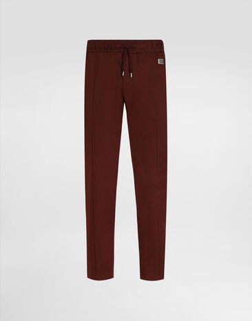 Dolce & Gabbana Jogginghose aus Baumwolle mit Plakette Mehrfarbig GYACETFUFNV