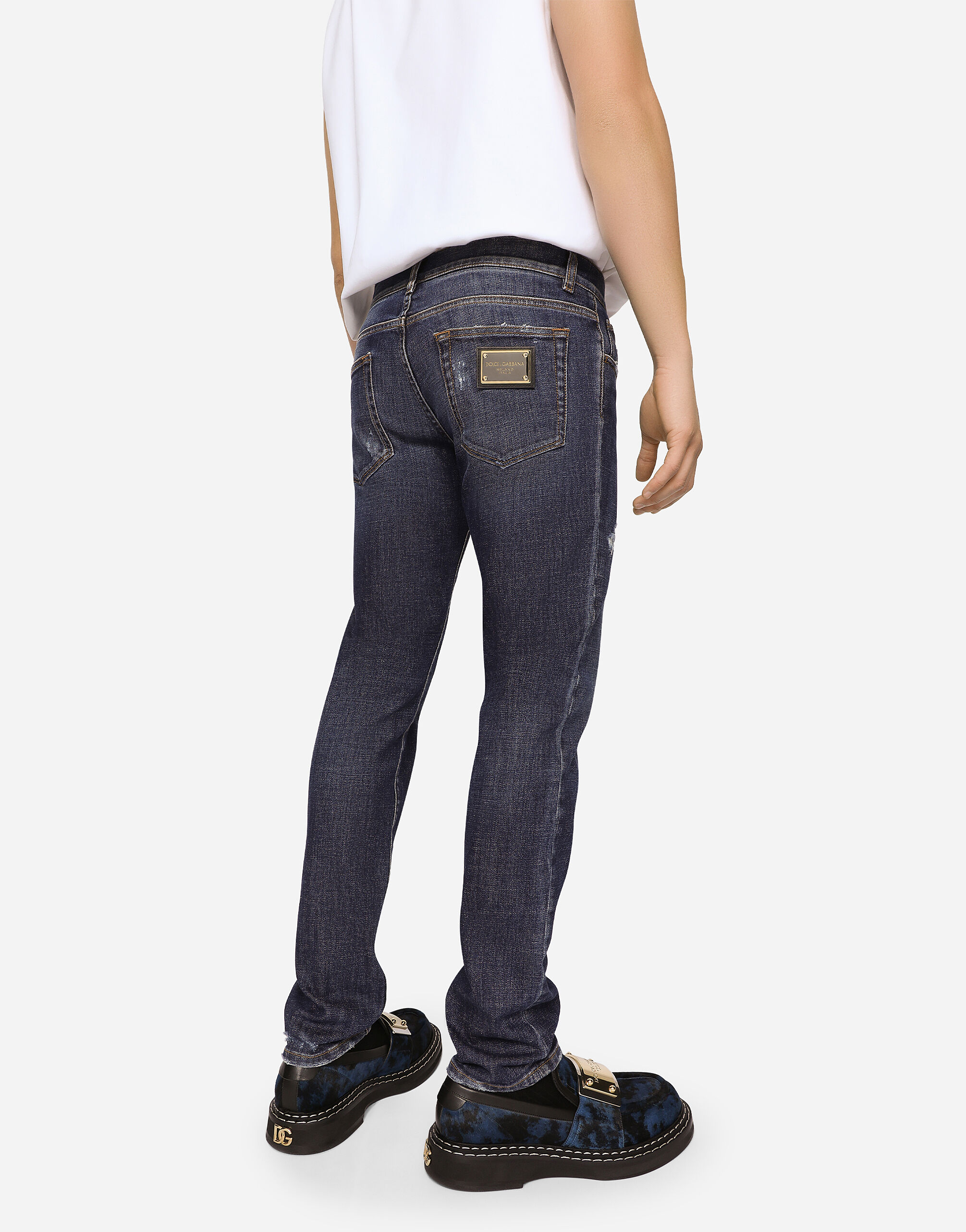 Mid blue skinny stretch jeans with abrasions in Multicolor for