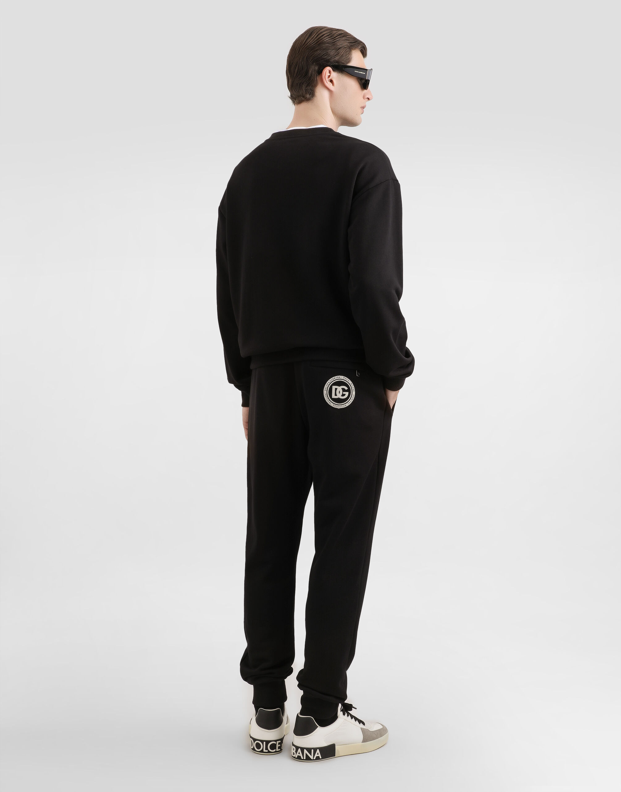 Jersey trousers with patch in Black for Men | Dolce&Gabbana® US