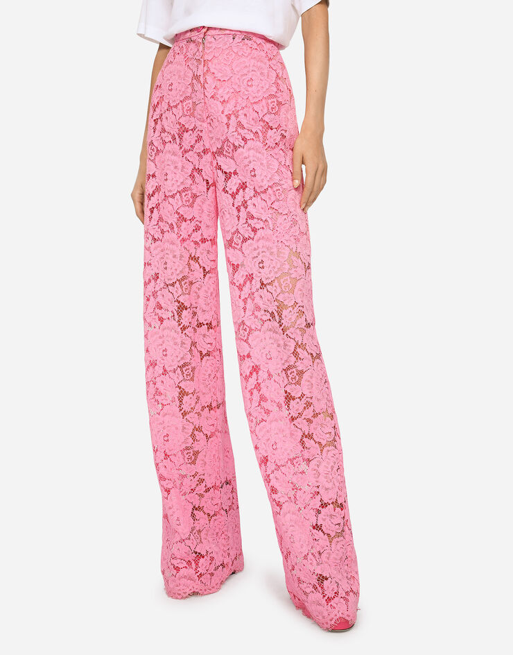 Dolce & Gabbana Pantalón acampanado de encaje elástico con logotipo Rosa FTCPTTFLRE1