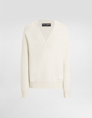 Dolce & Gabbana Pull en laine à encolure en V et broderie DG Blanc GXY34ZJCVWT