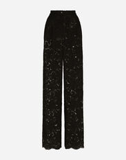 Dolce & Gabbana Pantaloni flare in pizzo stretch logato Stampa FTC3HTHS5Q0
