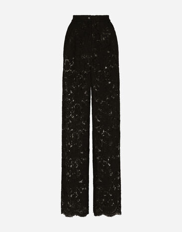 Dolce & Gabbana Ausgestellte Hose aus elastischer Spitze mit Logo Print FTC3HTHS5Q0
