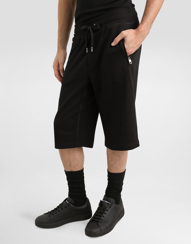 Dolce & Gabbana Bermudas de chándal en punto con placa con logotipo Negro GVB7HTG7F2G