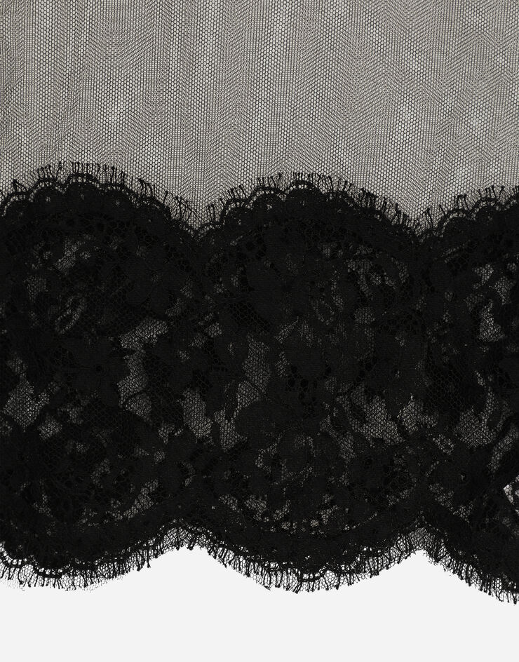 Dolce&Gabbana Top de cuello alto en tul con aplicaciones de encaje Negro F760RZHLM0U