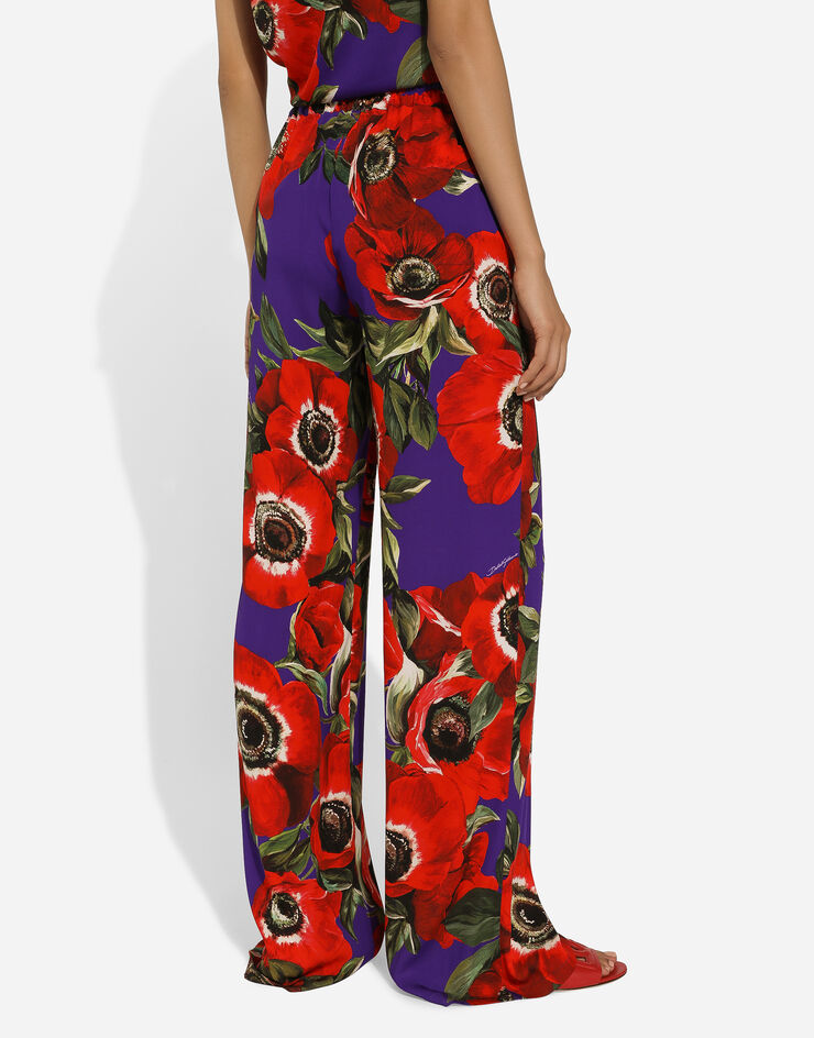Dolce & Gabbana Flared charmeuse pants with anemone print Print FTC12TFSA55