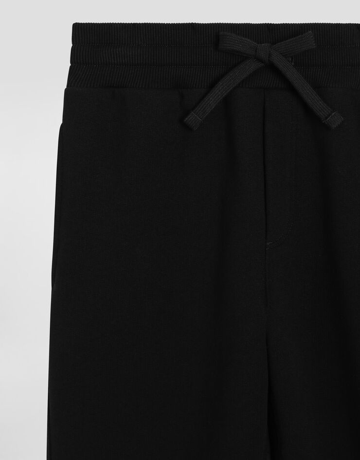 Dolce & Gabbana Fleece jogging pants with DG logo Black L4JPIGG7OSS