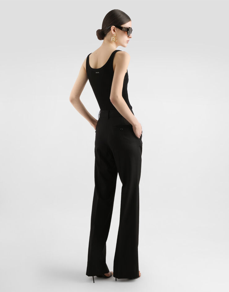 Dolce&Gabbana Flared flannel pants with logo tag Black FTCZITGDBWV