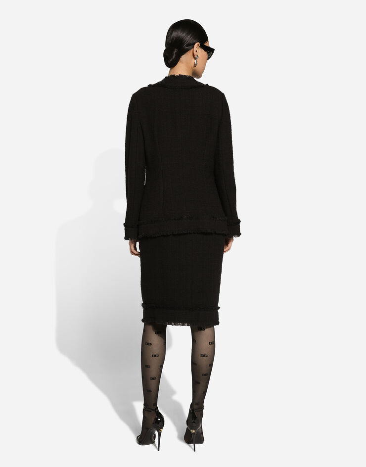Dolce & Gabbana Falda midi de tweed con logotipo DG Negro F4CTCTFMTAC