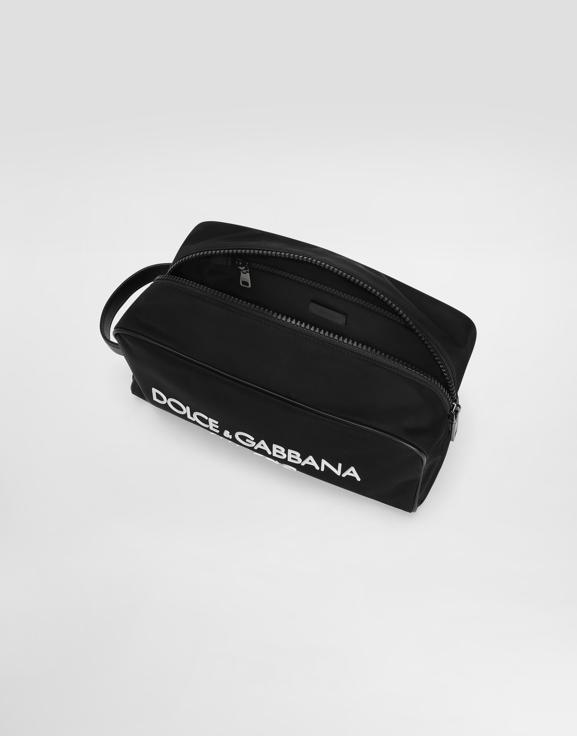 Nylon toiletry bag with rubberized logo
