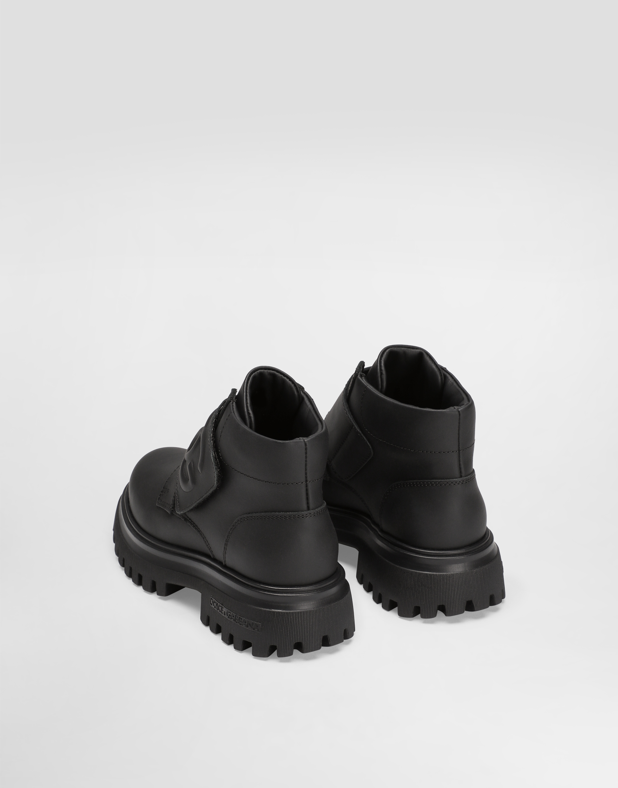 Dolce & Gabbana Calfskin Nappa Ankle Boots With Embossed Dg Logo In Black