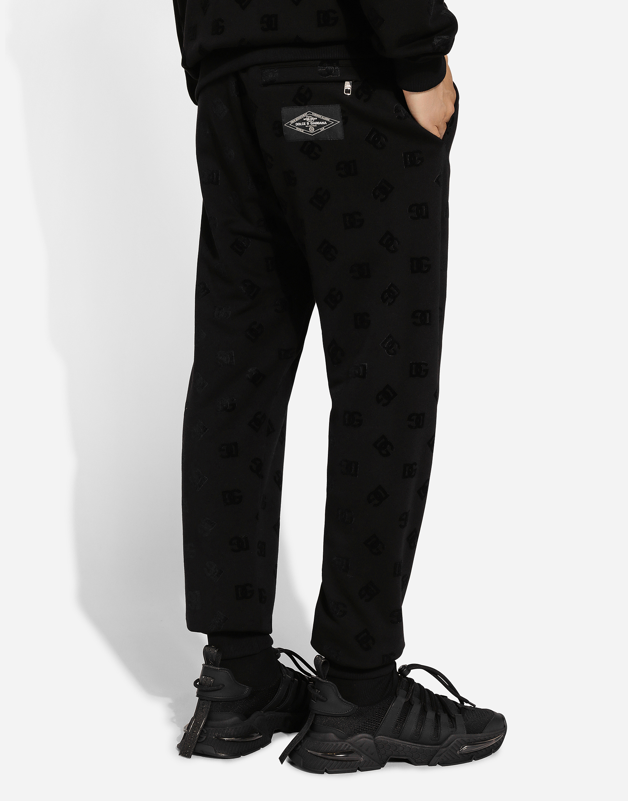 Dolce & Gabbana Monogram-embossed Cotton Track Pants In ブラック