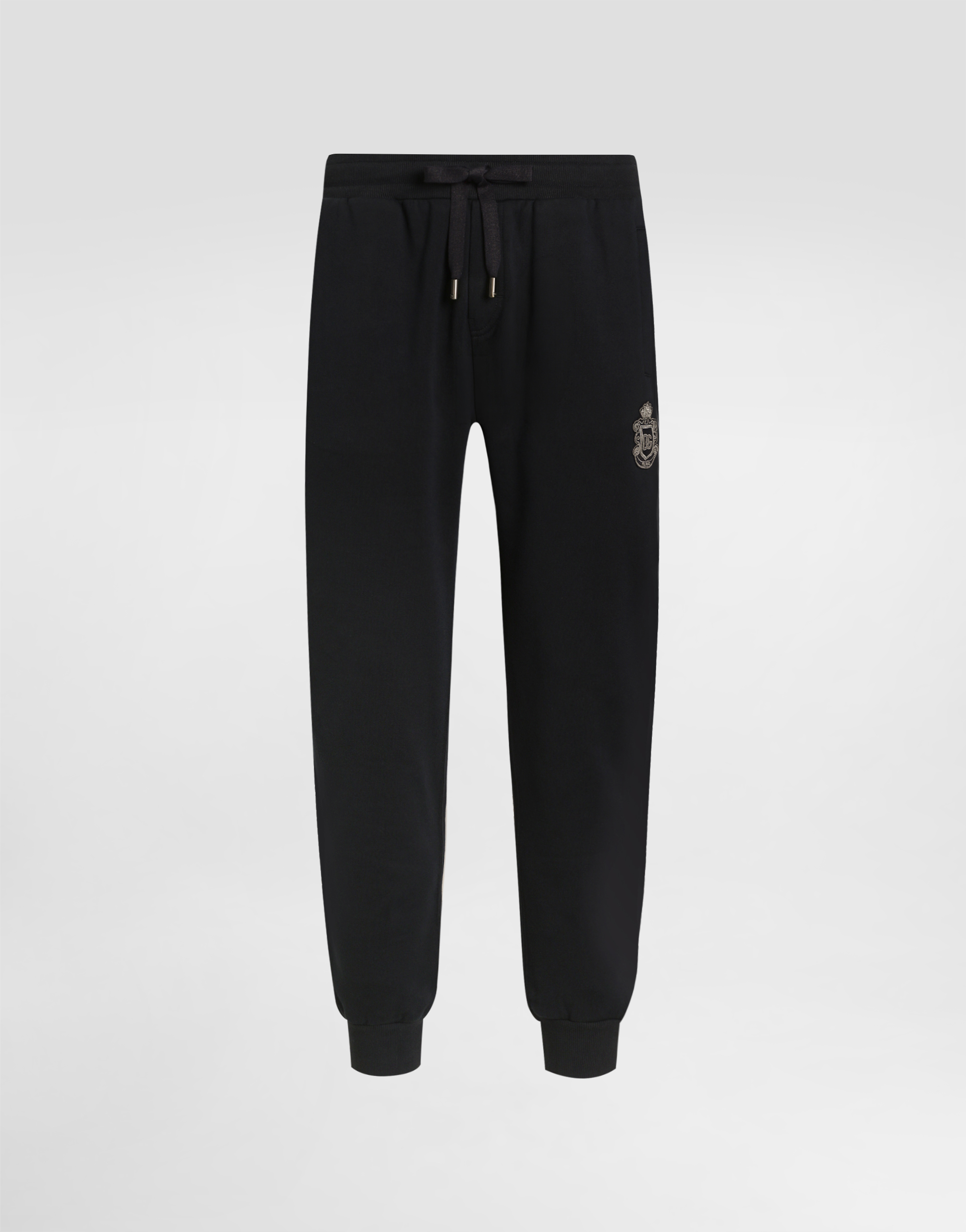 Jersey trousers with heraldic patch