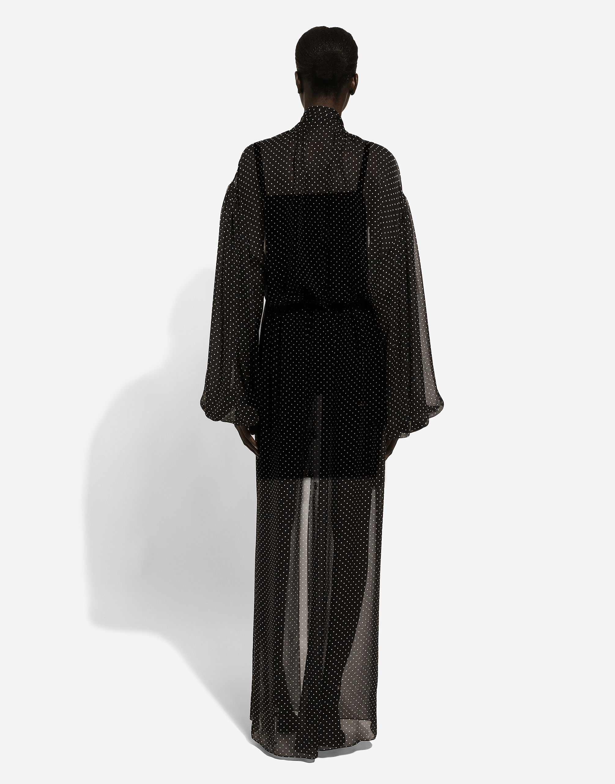 Long silk chiffon dress with polka-dot print, a pussy-bow detail and flower on neck