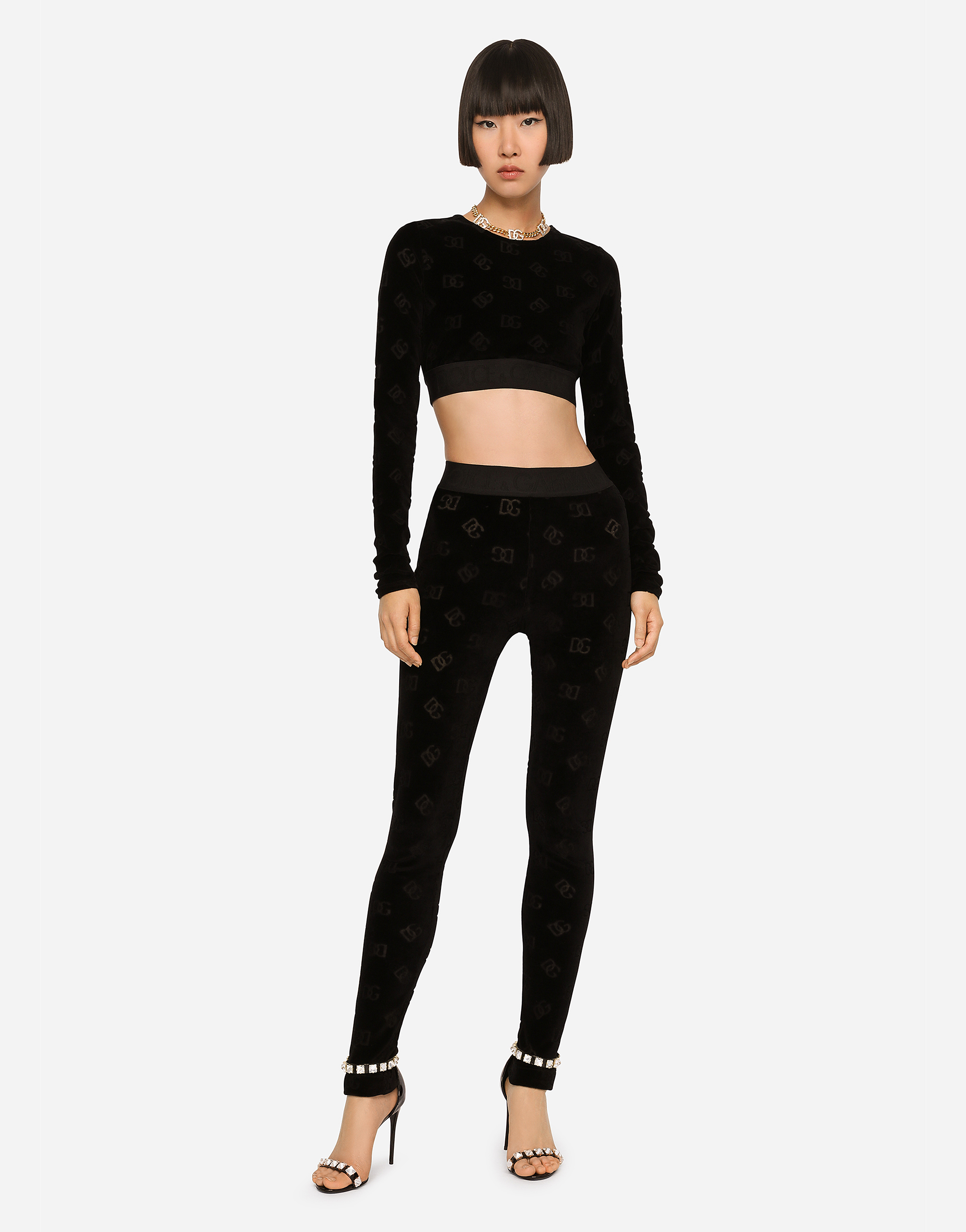 DOLCE & GABBANA FLOCKED JERSEY LEGGINGS WITH ALL-OVER DG LOGO