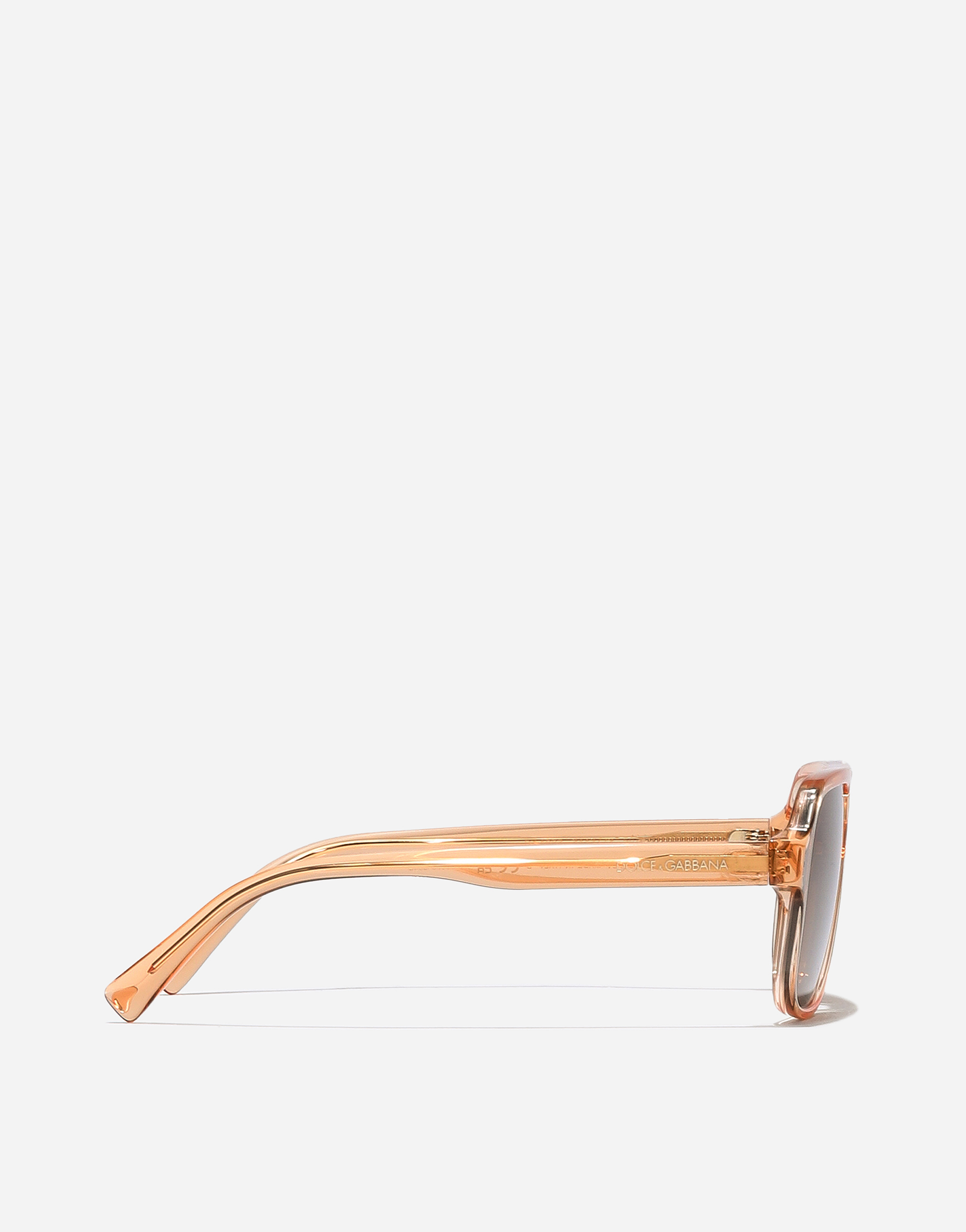 Shop Dolce & Gabbana نظارة شمسية Mini Me In Transparent Orange