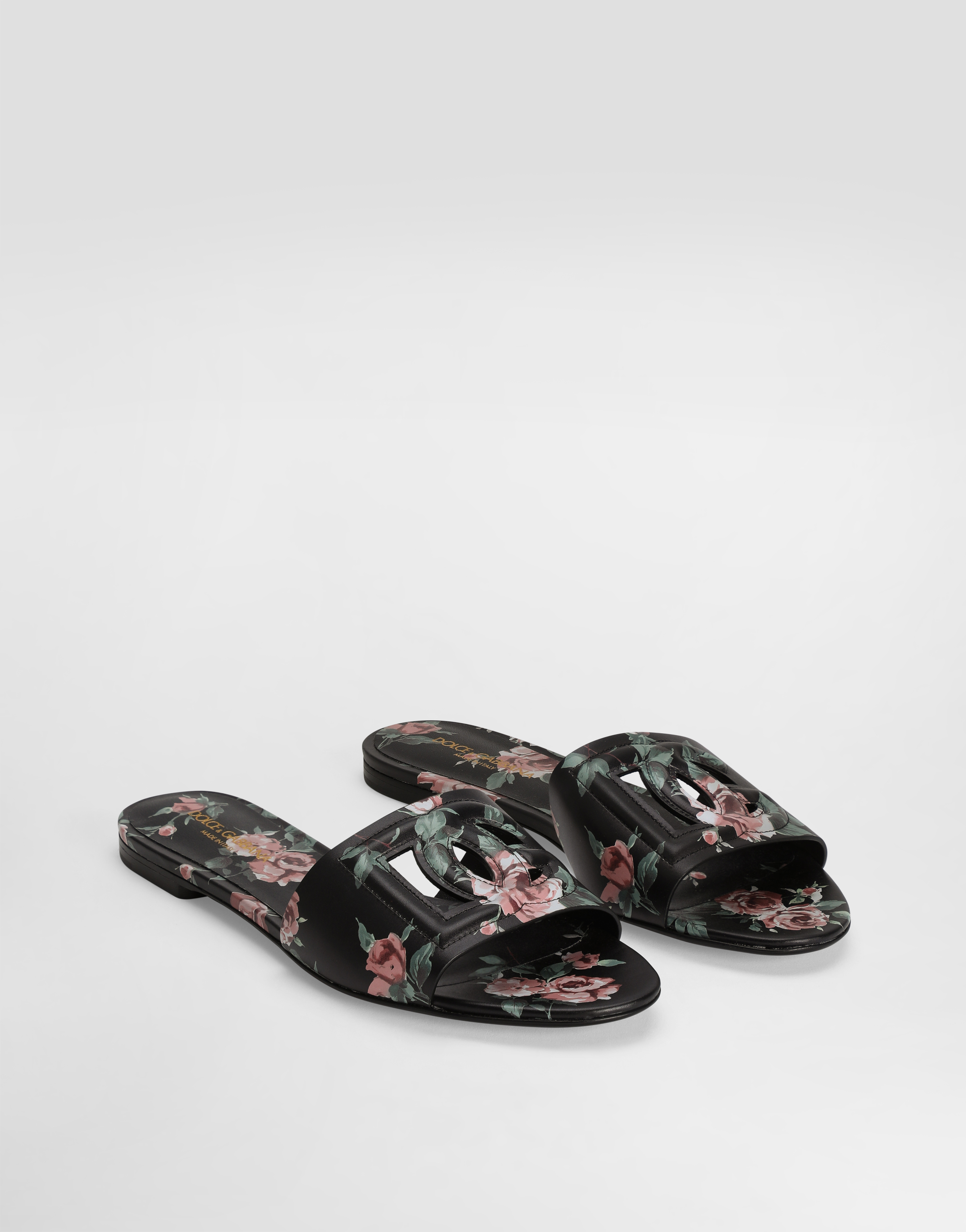 Calfskin flat slippers with rose print
