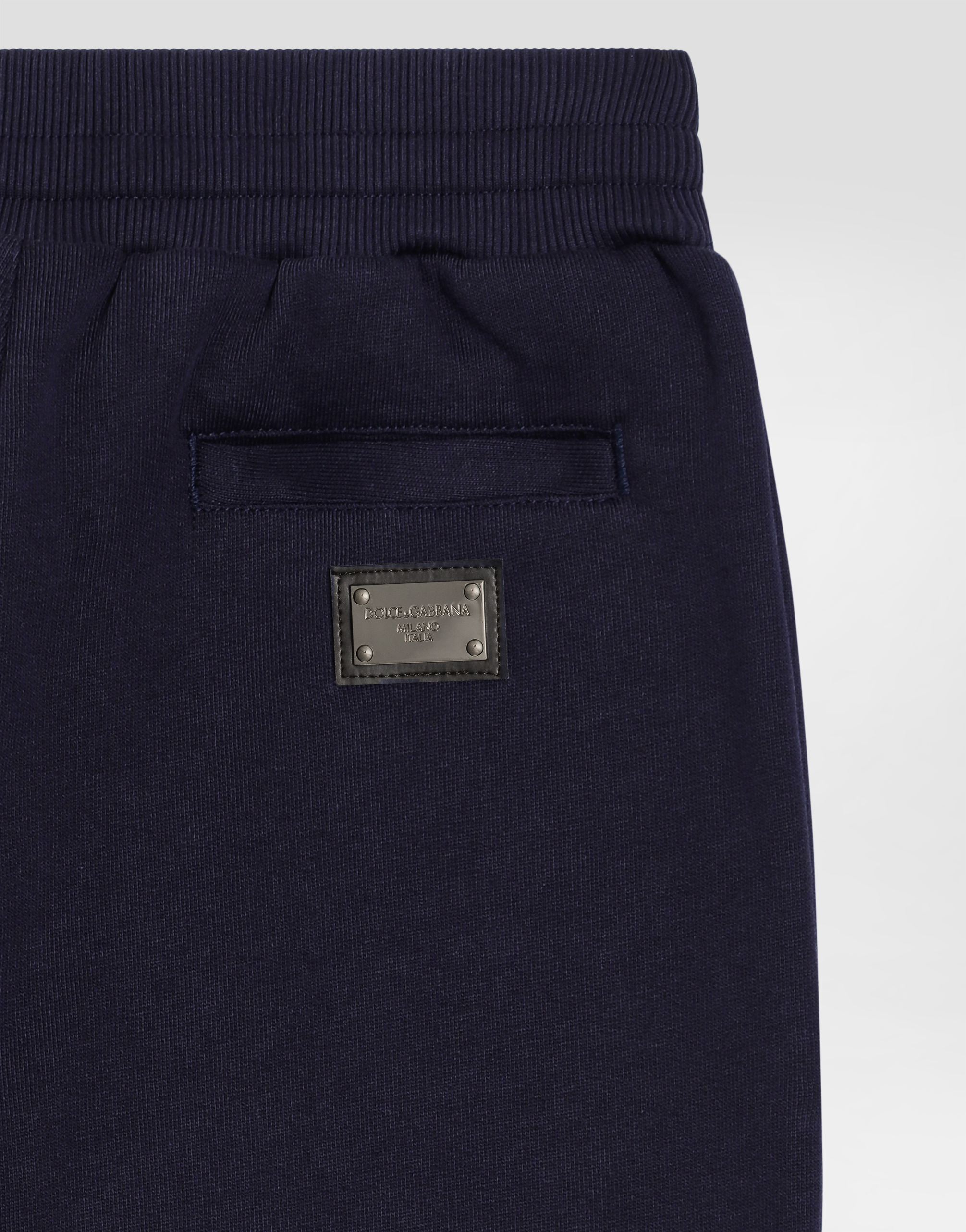 Fleece trousers with DG logo plaque