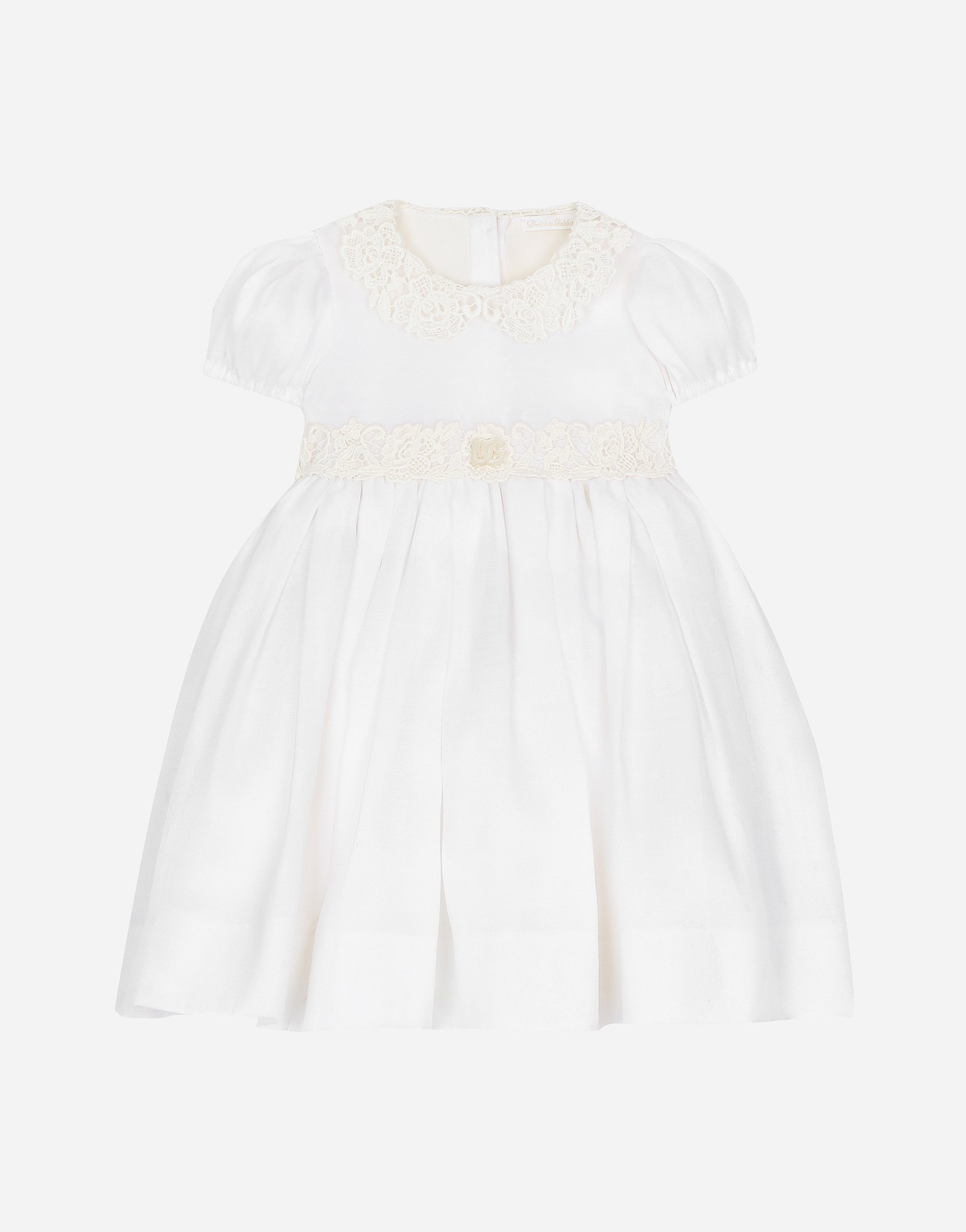 Empire-line muslin christening dress with short sleeves
