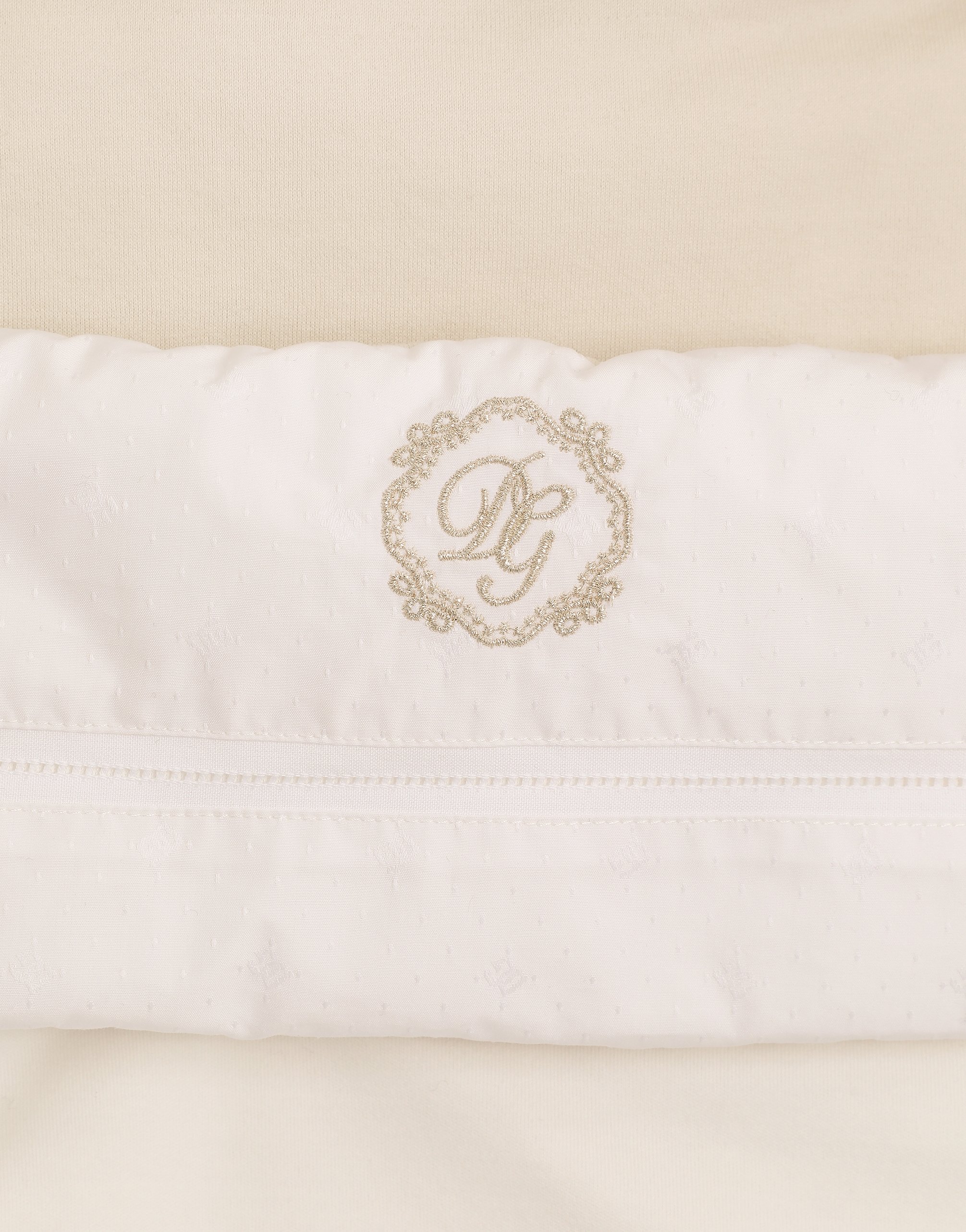 Newborn interlock baby nest with logo and polka dots