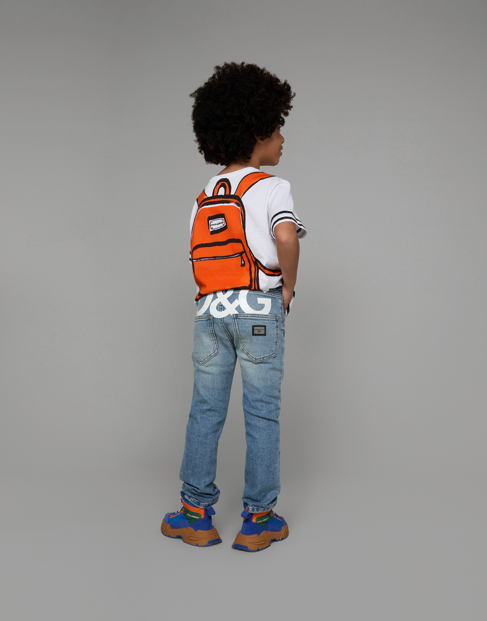 5-pocket treated stretch denim jeans with logo print