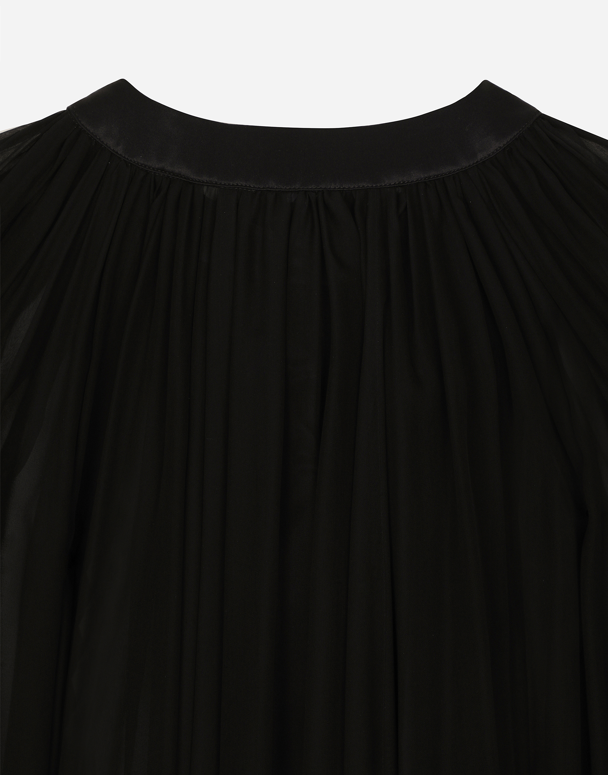 Silk chiffon cape with flower appliqué
