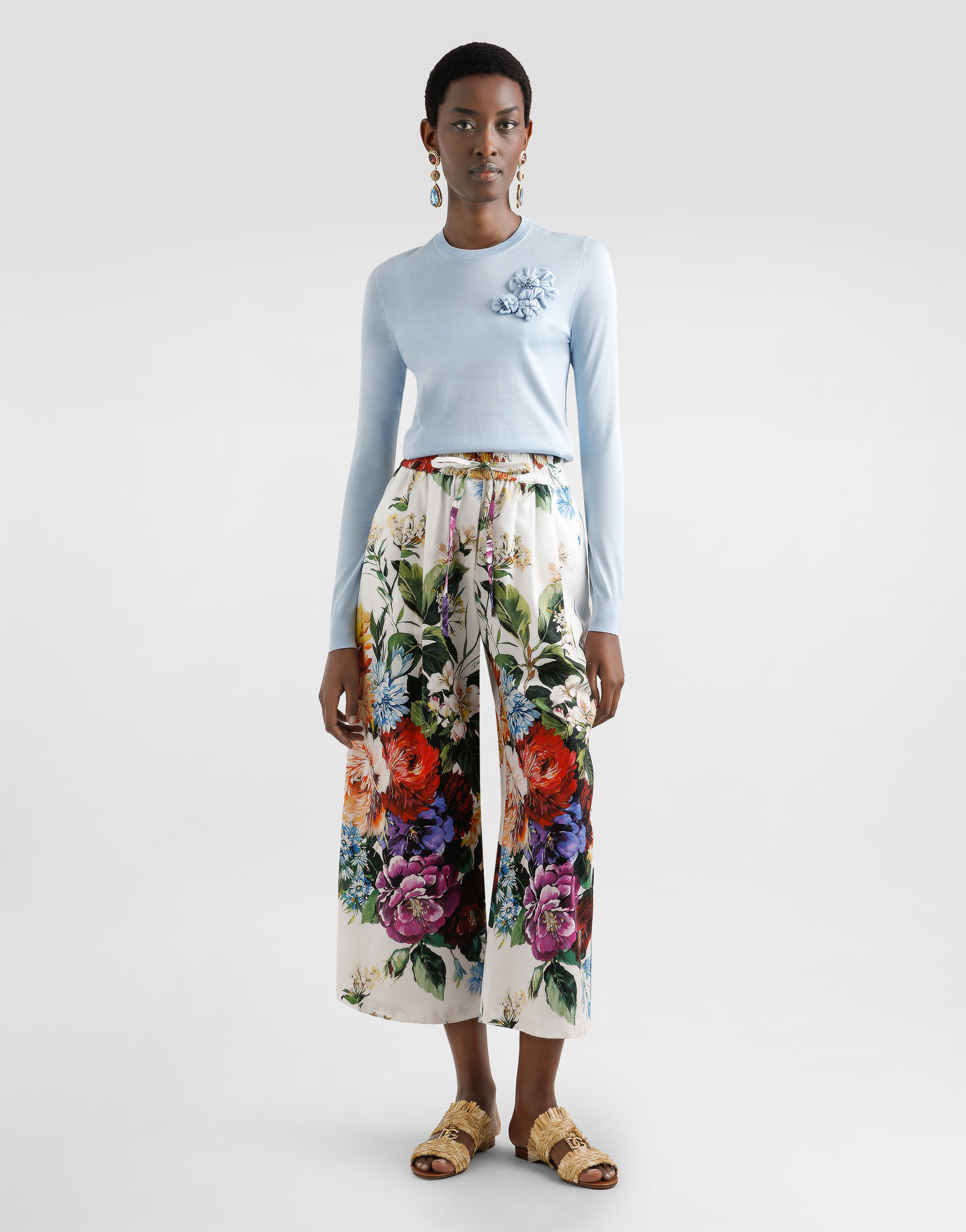 Silk pullover with flower brooch