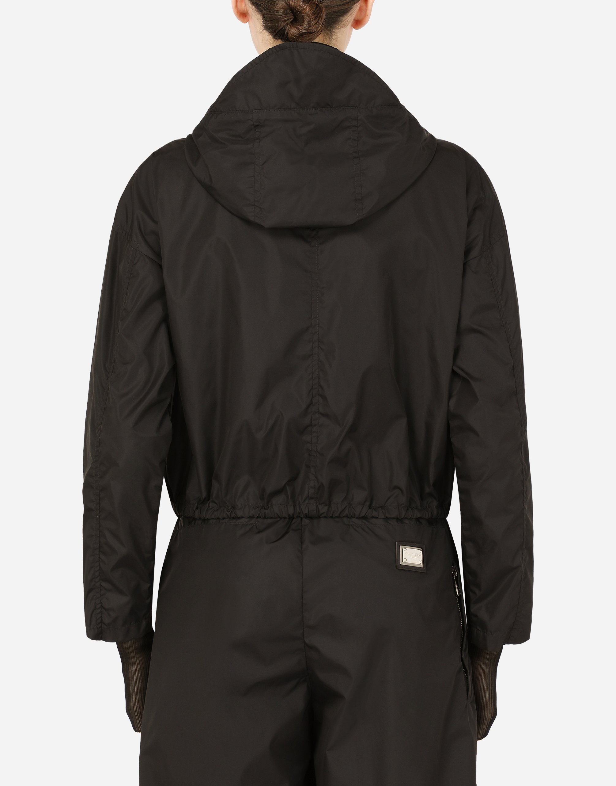 Technical fabric windbreaker with hood