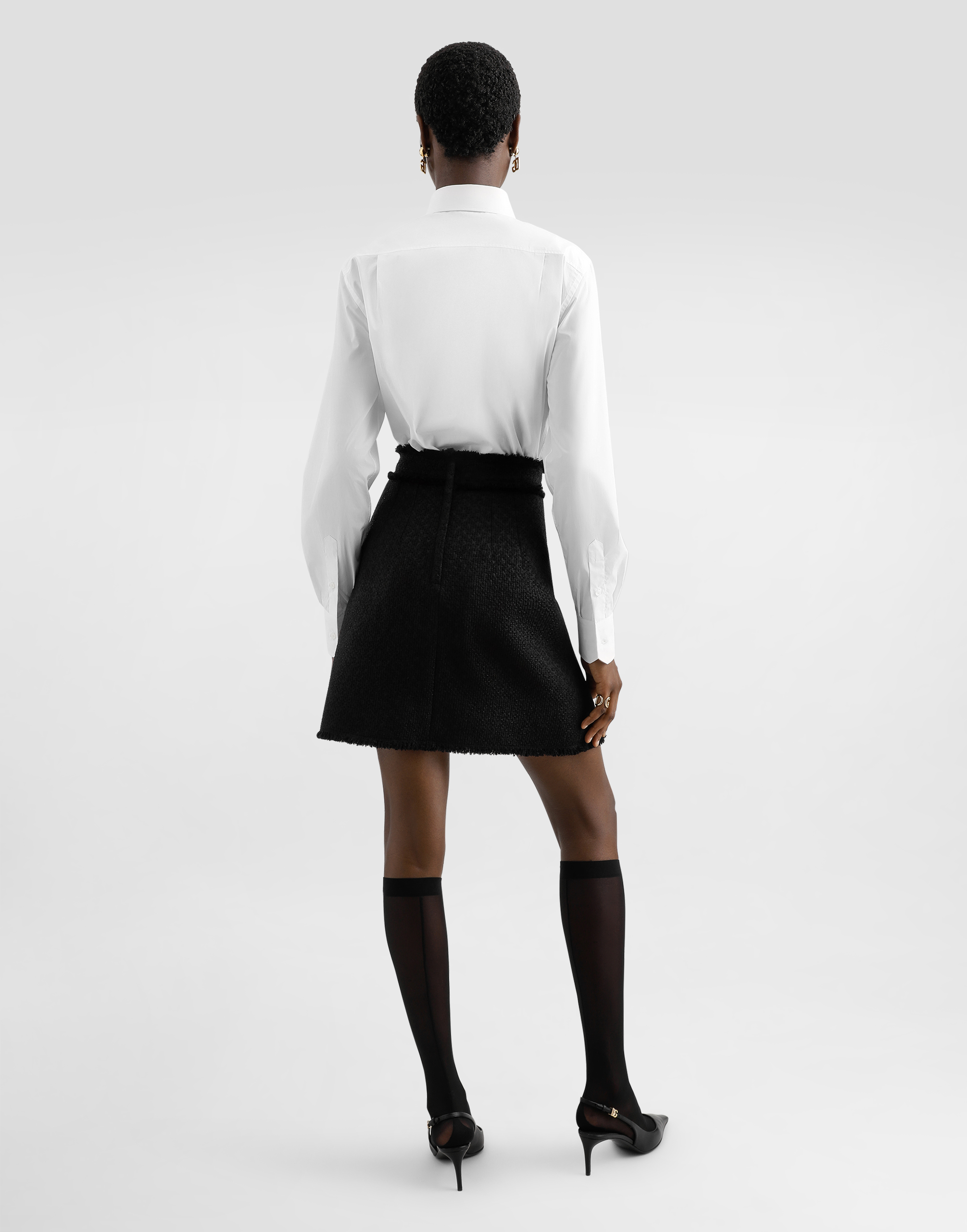 Dolce & Gabbana Short Raschel Tweed Skirt With Decorative Dg Logo Buttons In Black