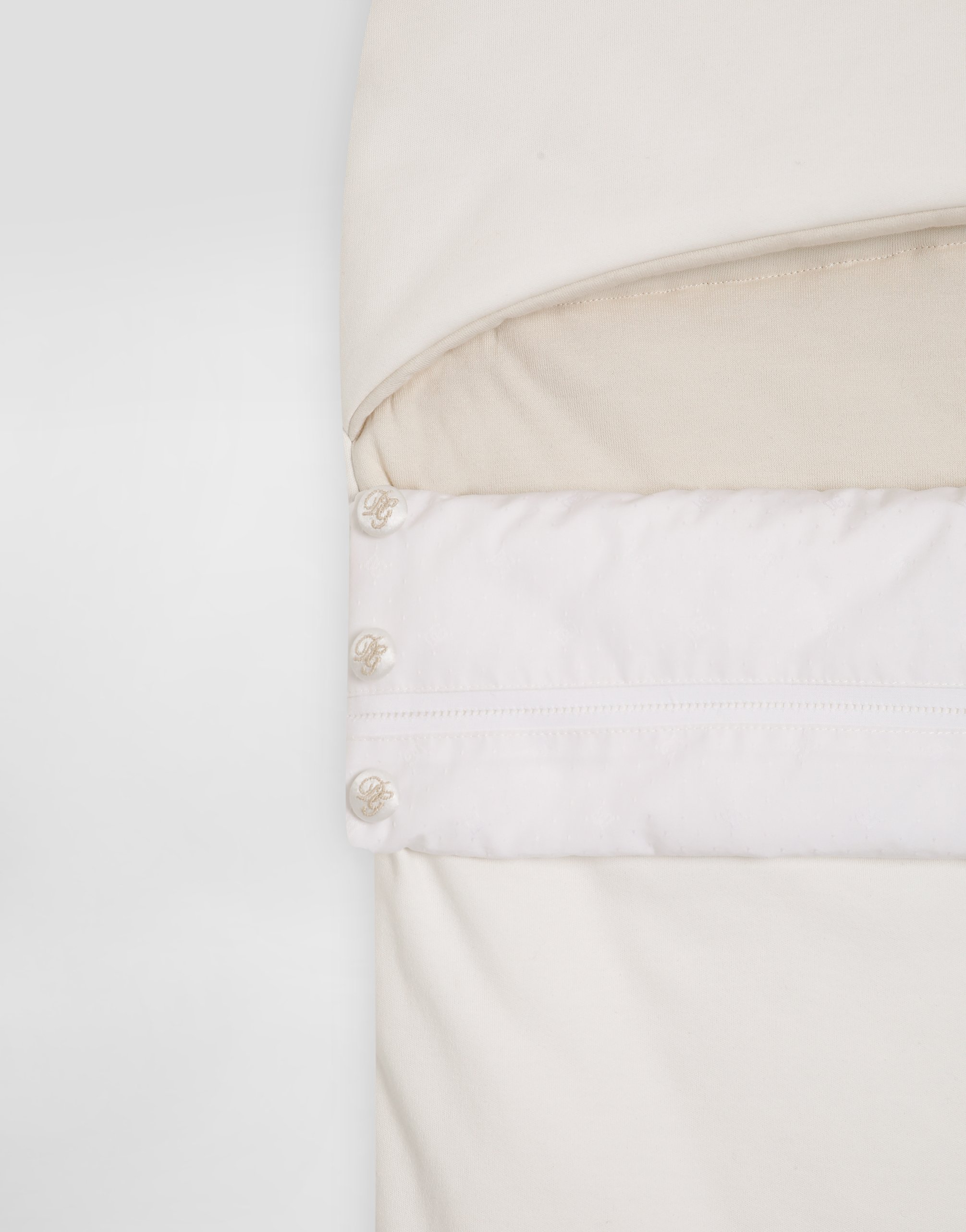 Newborn interlock baby nest with logo and polka dots