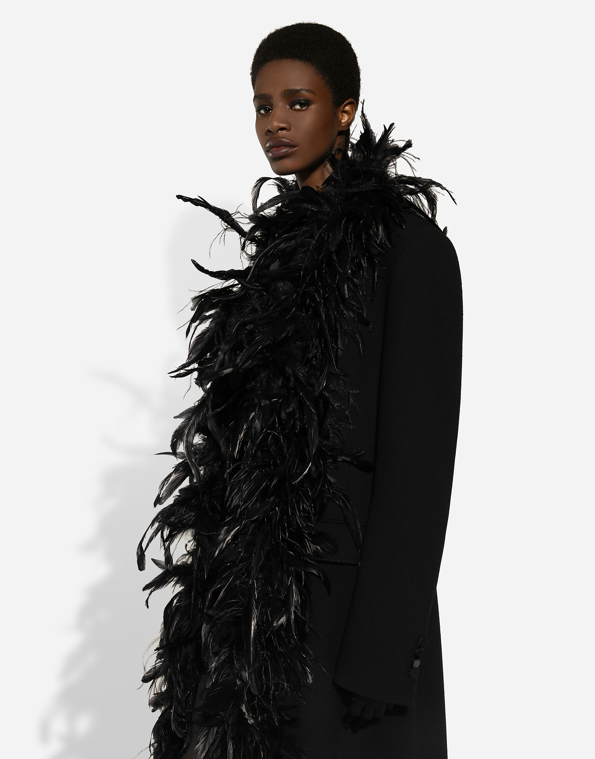Double-breasted wool crepe coat with belt and rooster feather embellishment