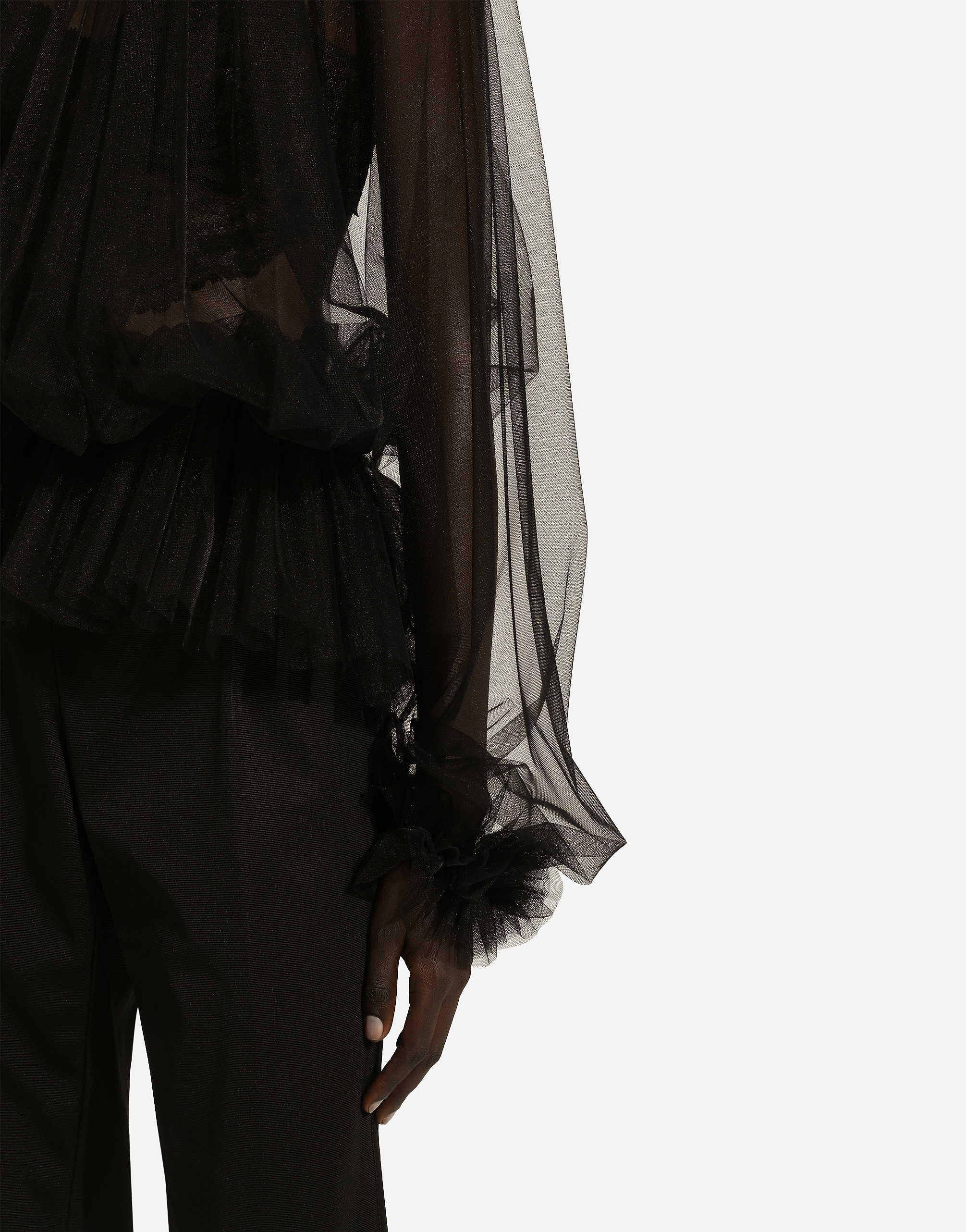 Tulle blouse with ruffles on the neck and cuffs