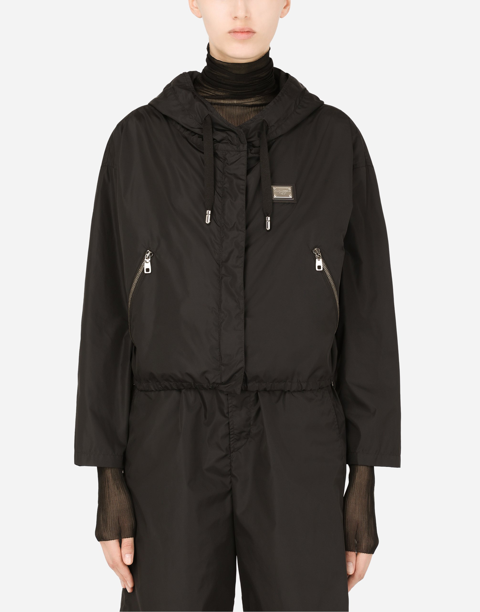 Technical fabric windbreaker with hood