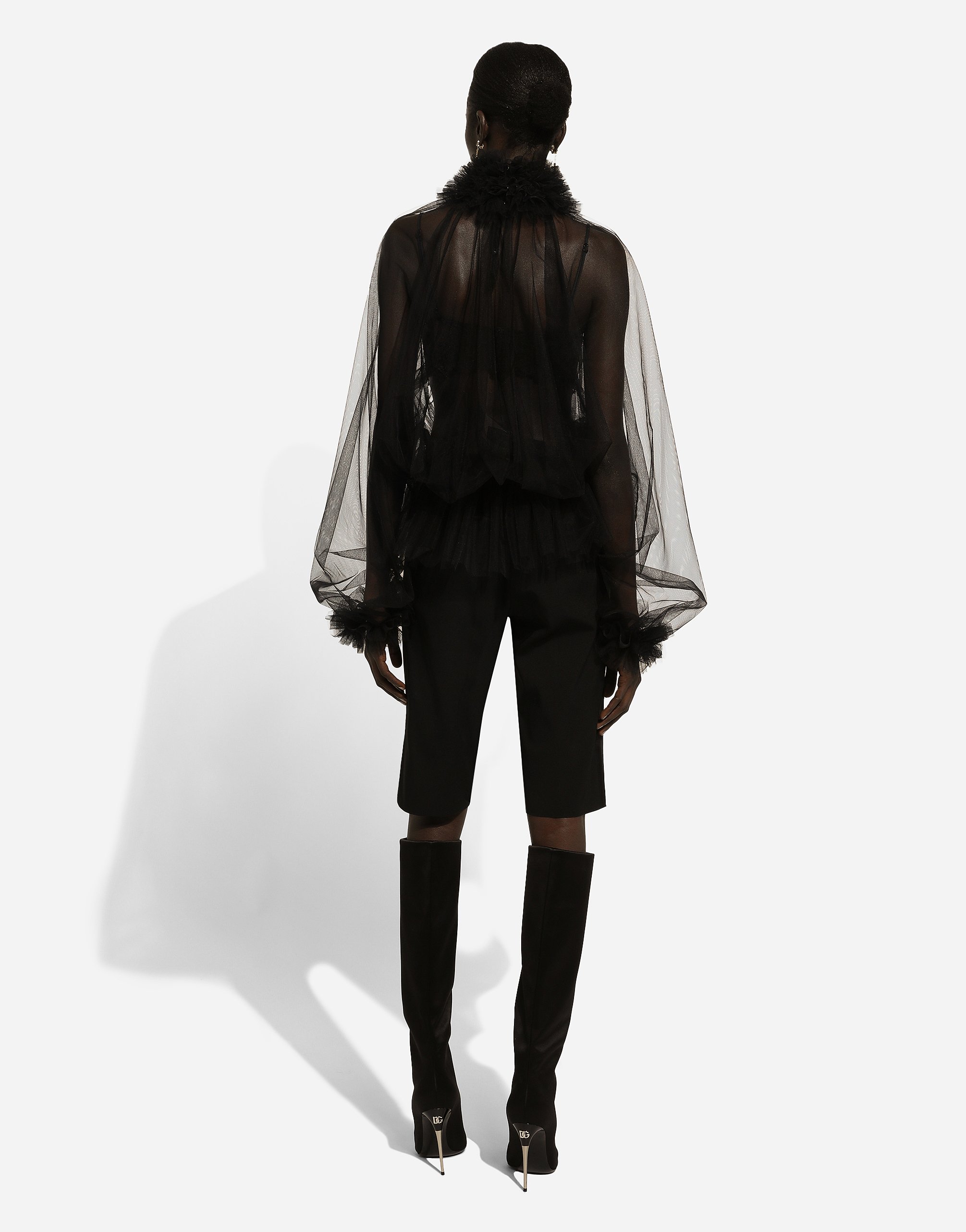 Tulle blouse with ruffles on the neck and cuffs