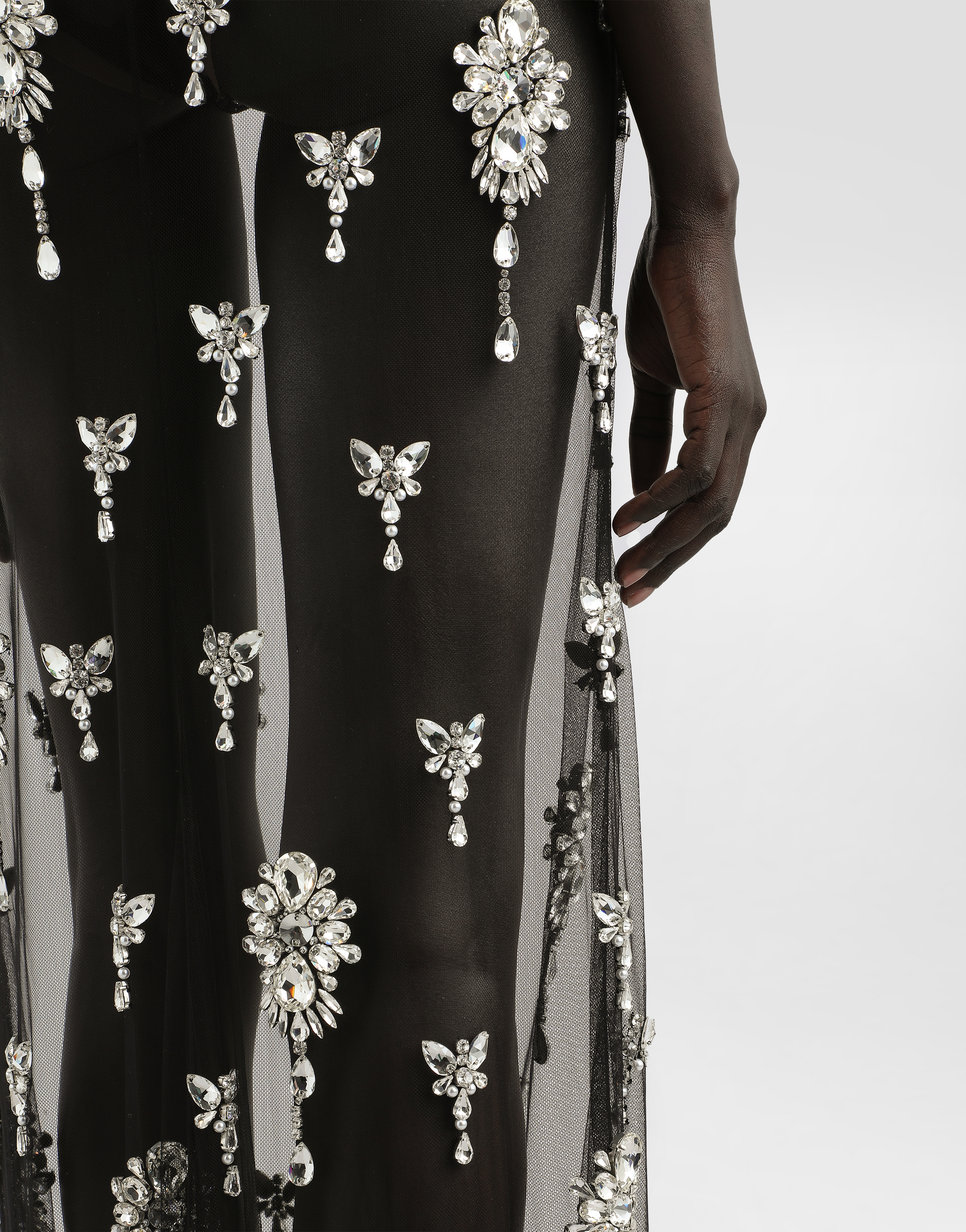 Long dress in tulle embroidered with rhinestones