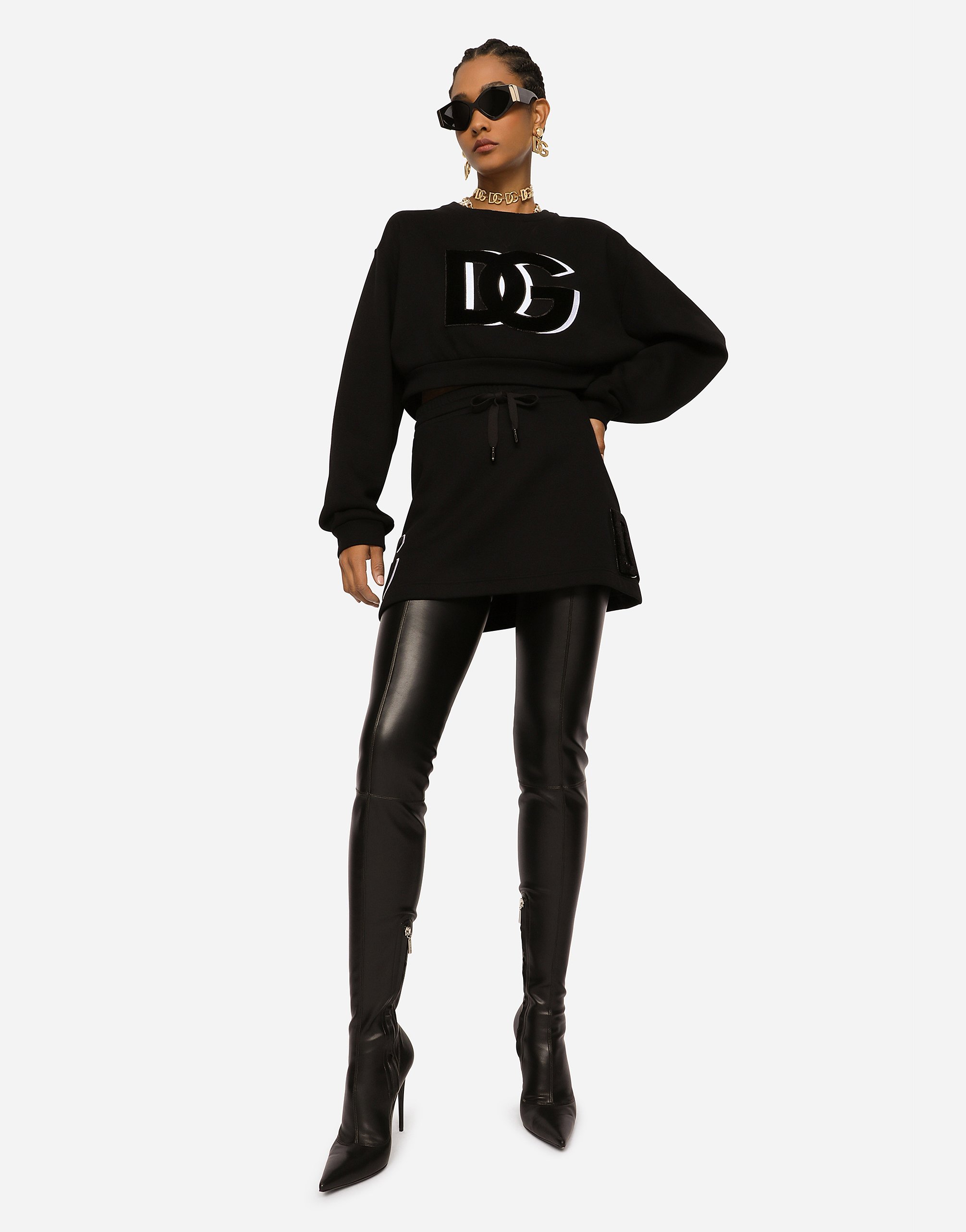 Dolce & Gabbana Jersey Miniskirt With Logo Patch In Black