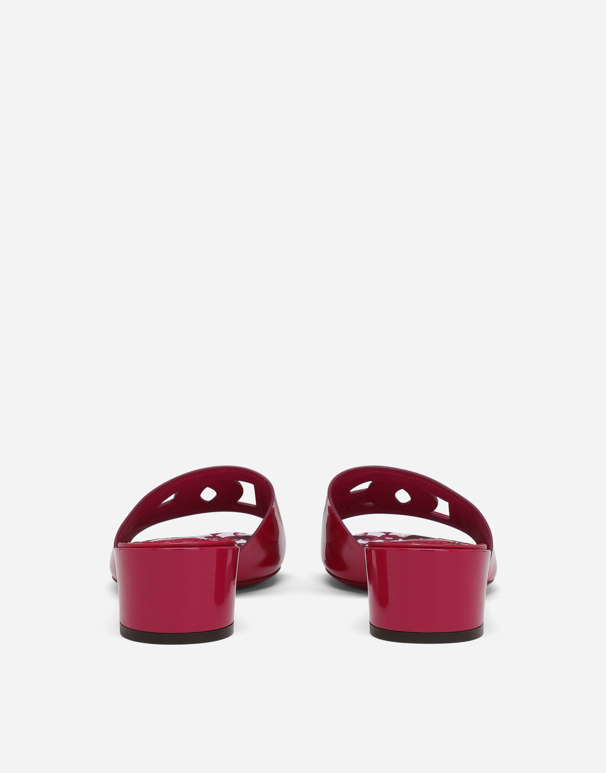 Shop Dolce & Gabbana Patent Leather Dg Mules With Cut-out In Fuchsia