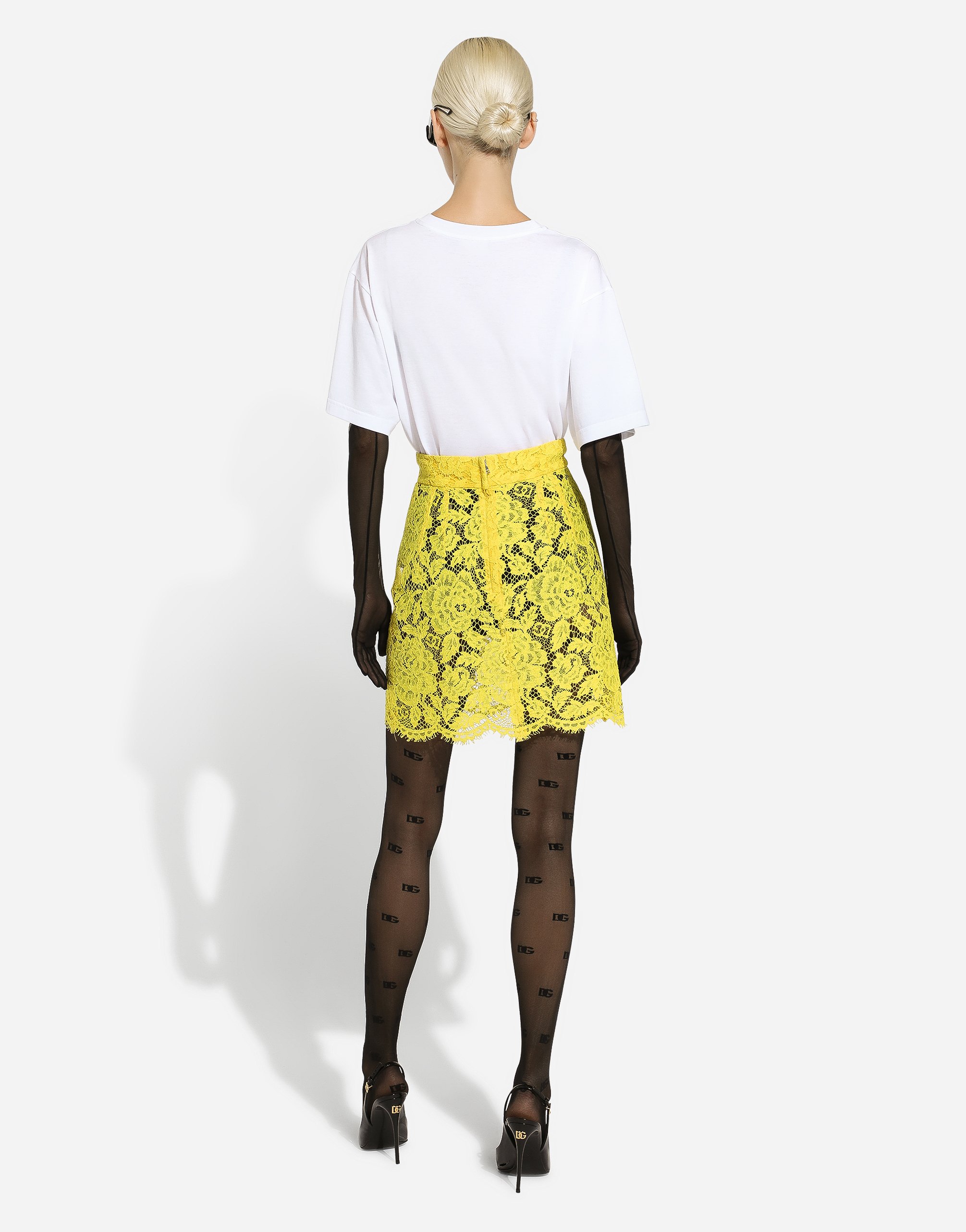 Shop Dolce & Gabbana Branded Floral Cordonetto Lace Miniskirt In イエロー