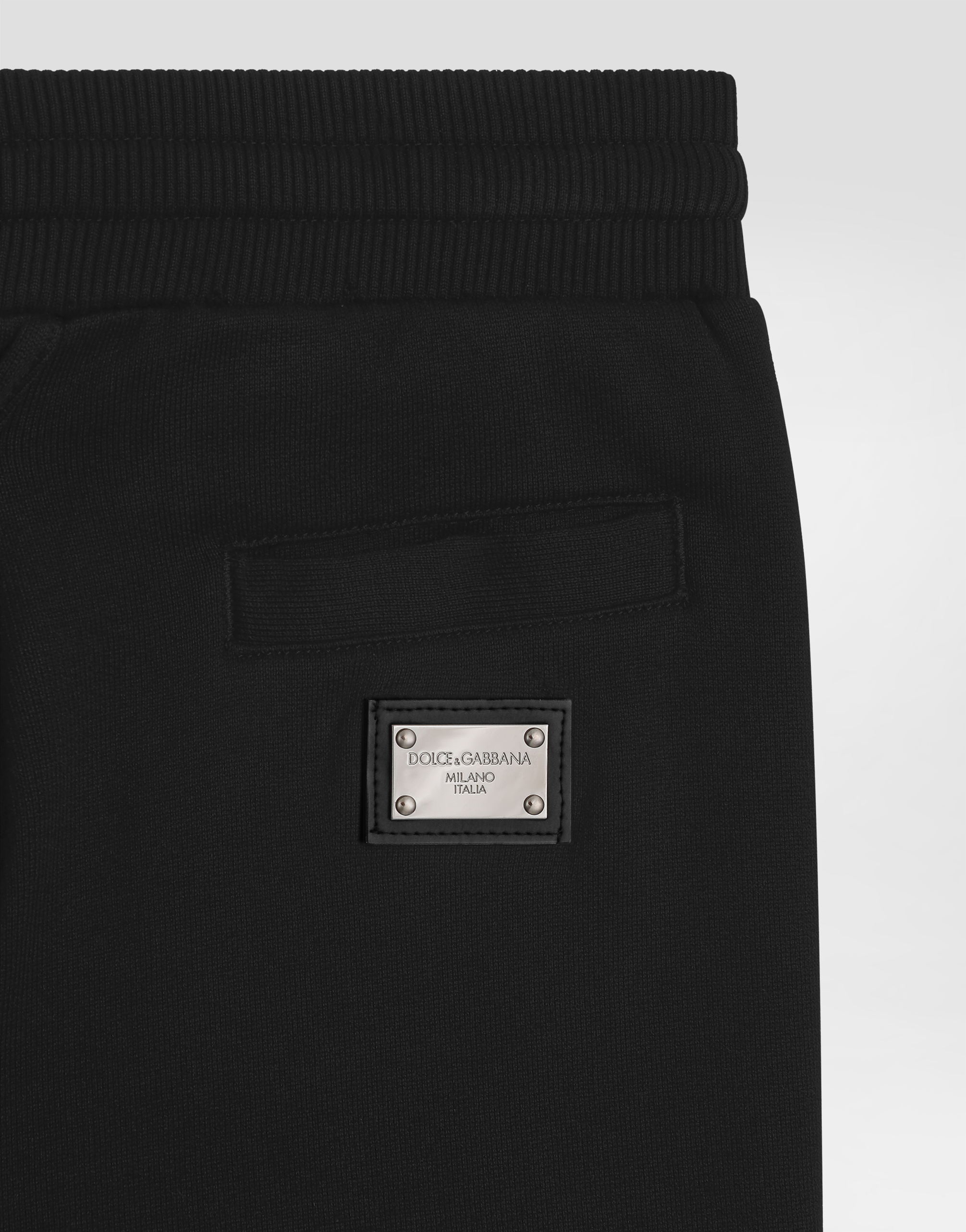 Fleece trousers with DG logo plaque