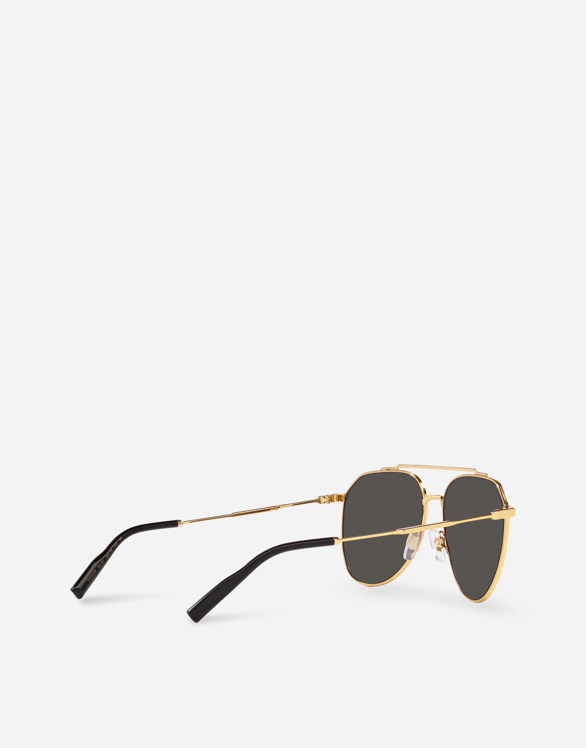 Shop Dolce & Gabbana Diagonal Cut Sunglasses In Gold