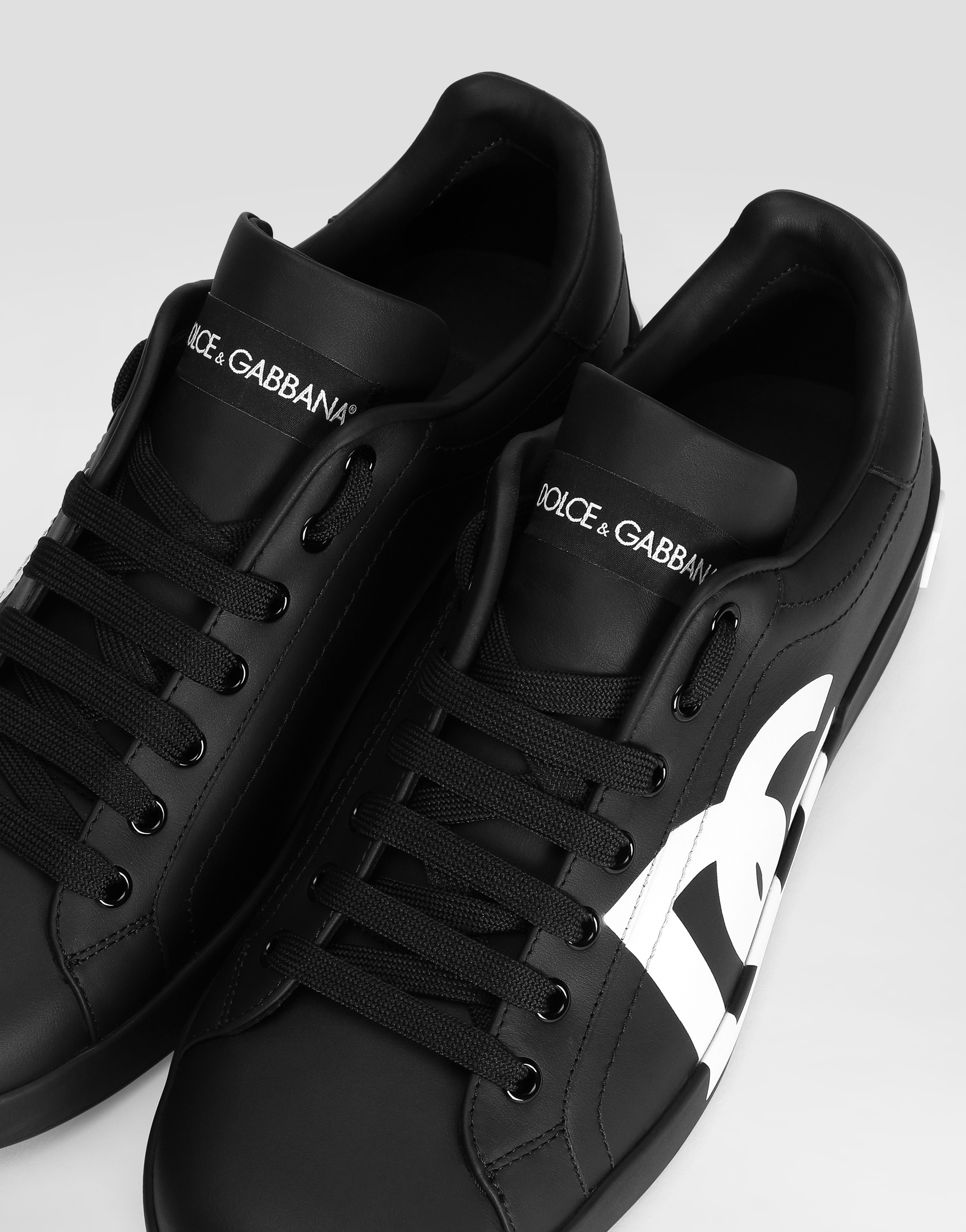 Shop Dolce & Gabbana Calfskin Nappa Portofino Sneakers With Dg Logo Print In Black