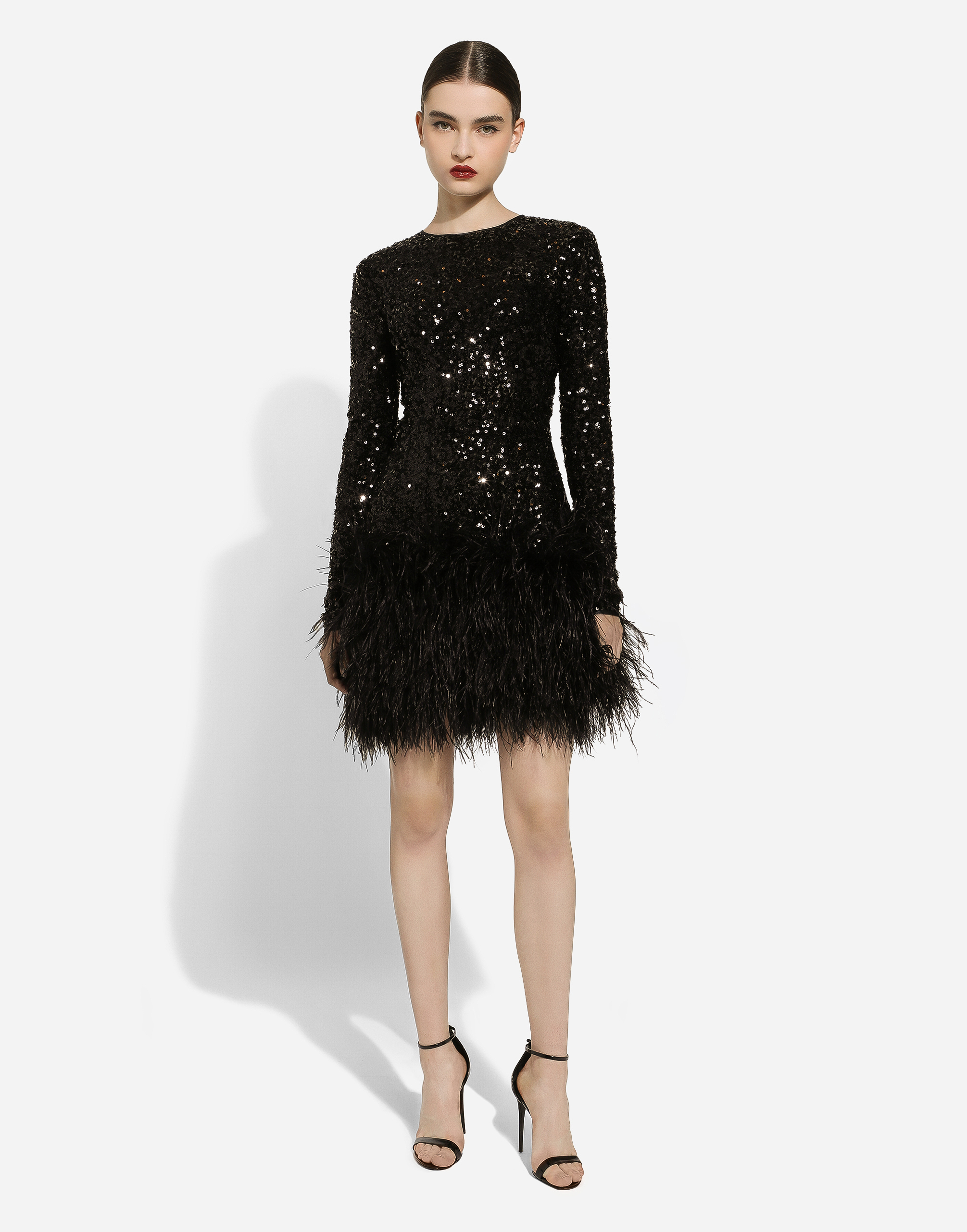 Short sequined dress with feather trim